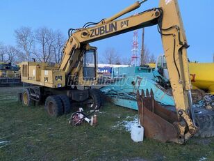 Caterpillar 212B FT  excavadora de ruedas