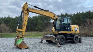 Caterpillar M313D excavadora de ruedas