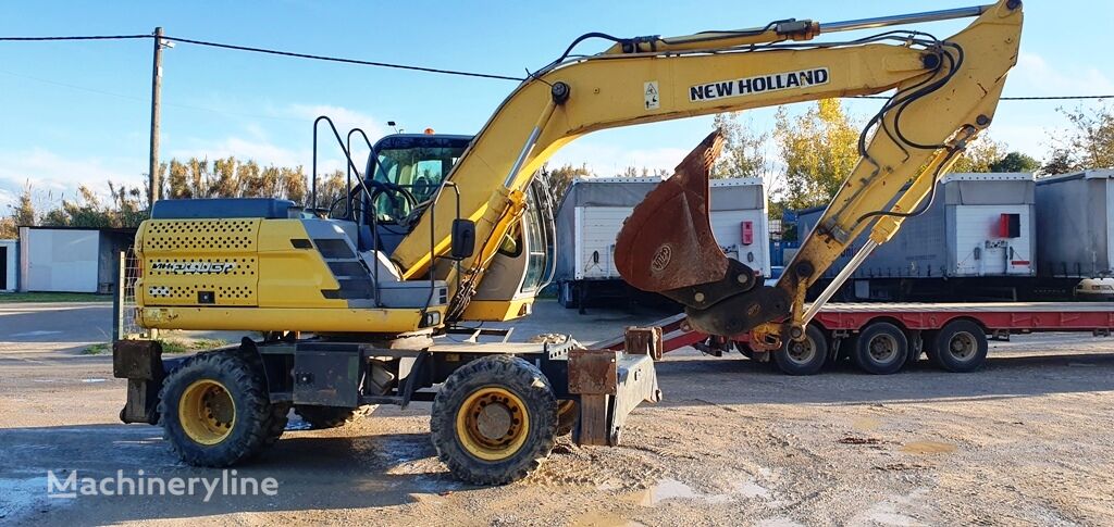 New Holland MH PLUS C  excavadora de ruedas