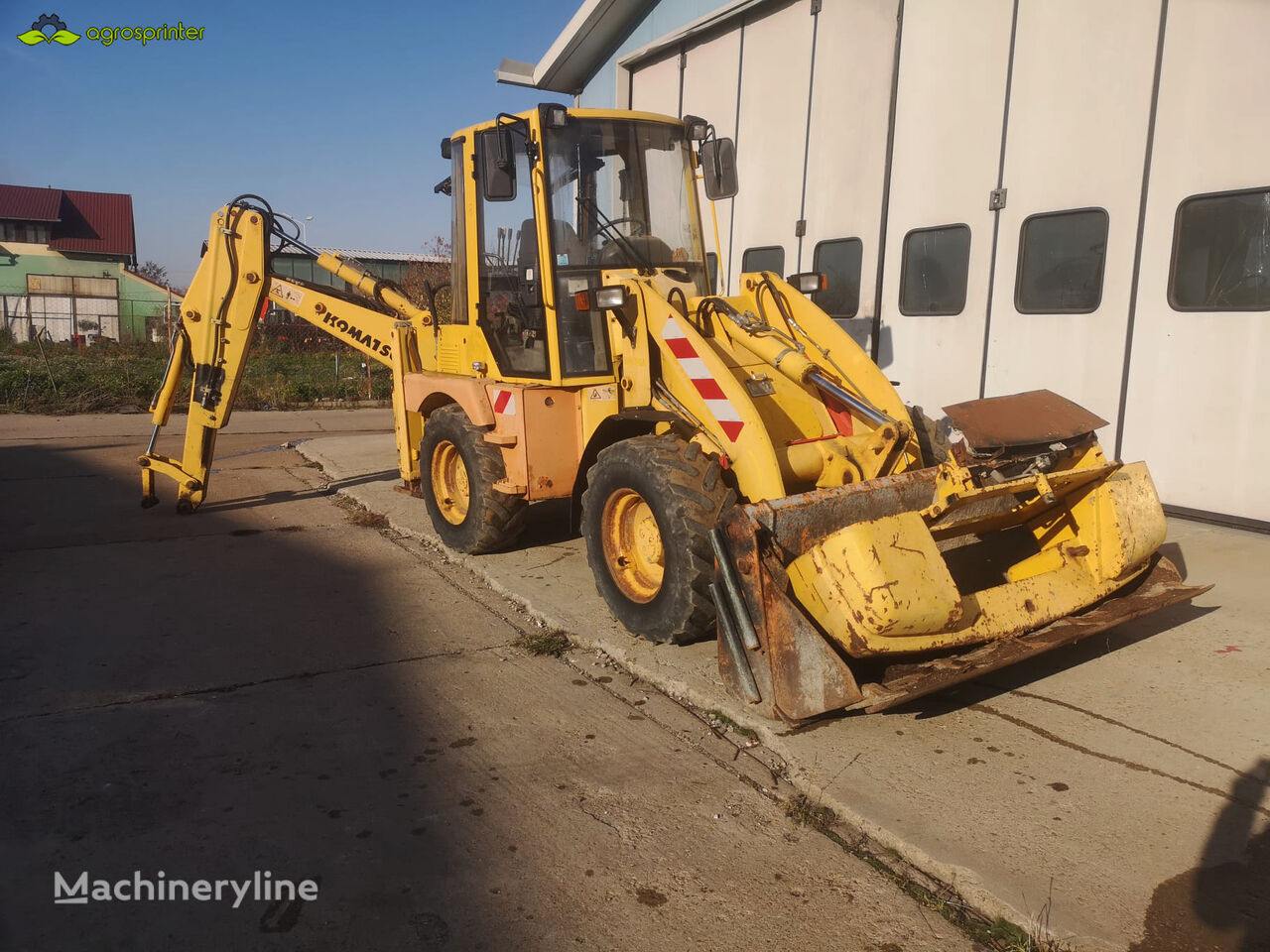 Komatsu WB70 A retroexcavadora